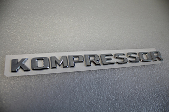 Надпись Kompressor 