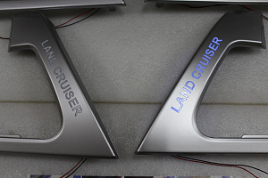 Тюнинг для Накладки Land Cruiser 200 на ручки дверей салона , с подсветкой серебро